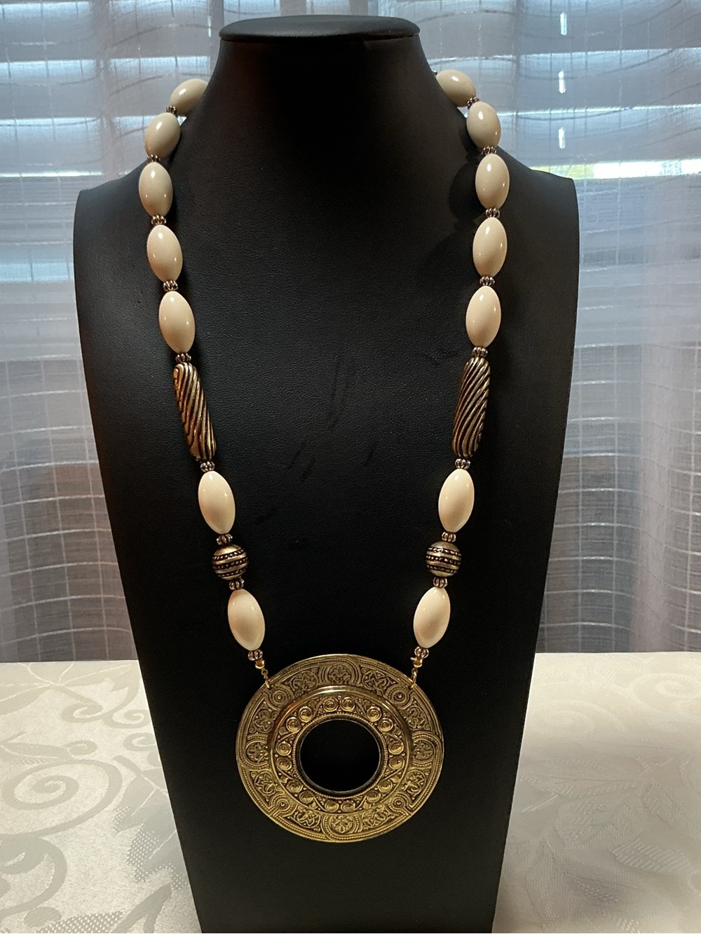 Cream Resin Etruscan Medallion Antiqued Brass Pendant Necklace